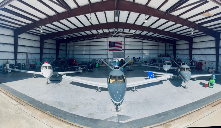 Turbine maintenance hangar with eight SF50 jets.